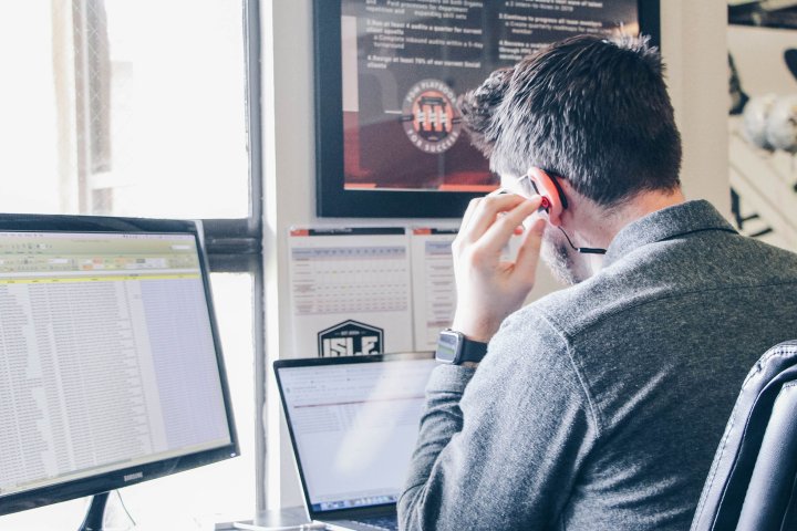 man-computer-headset-listen